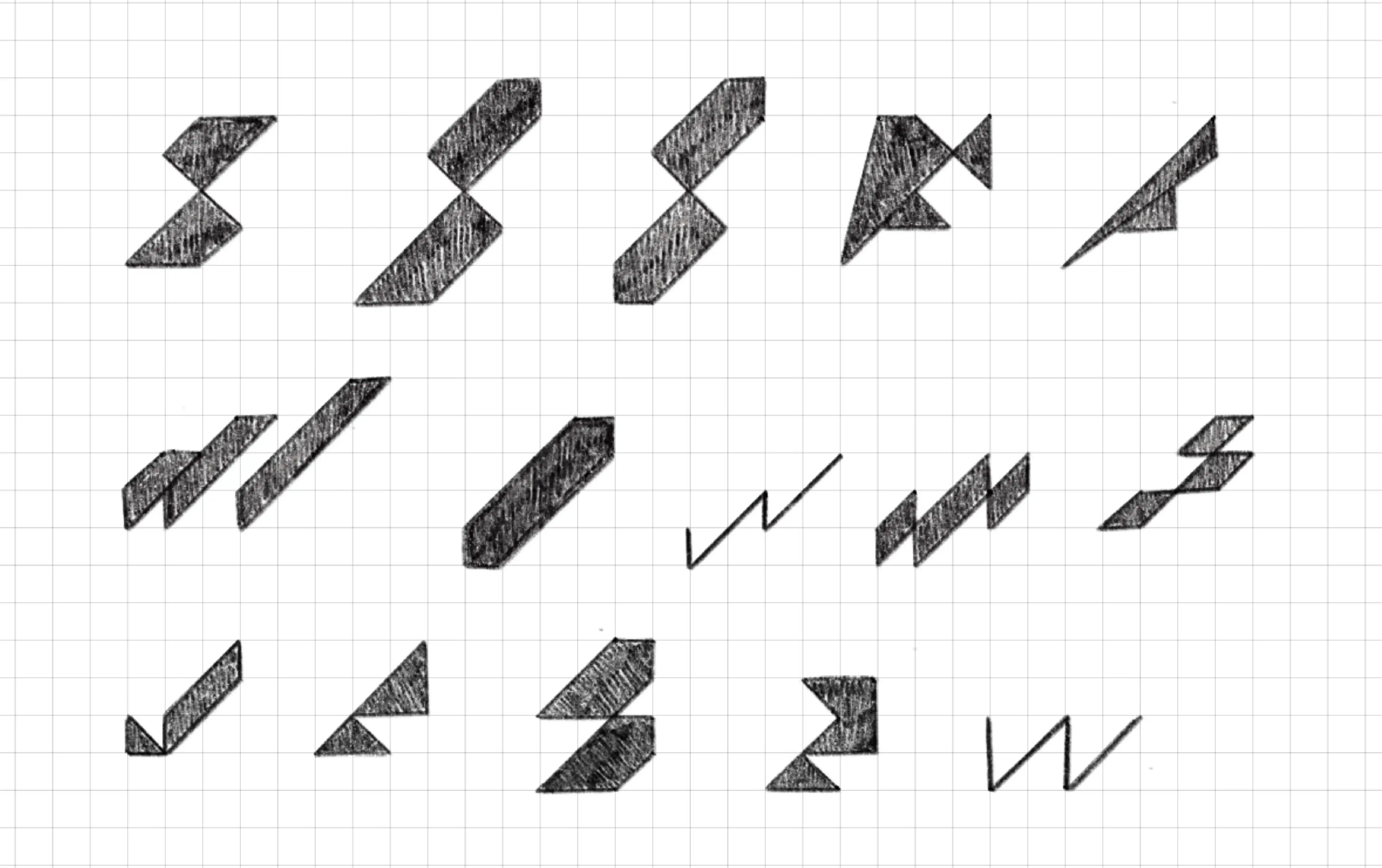 multiple scratches of logos on black over a white background.